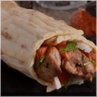 Kalkoenshaas van de houtskoolgril